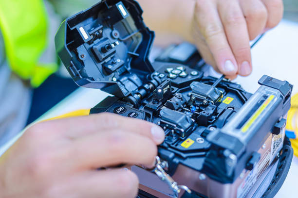 Technician working on fibre optic cable installation
